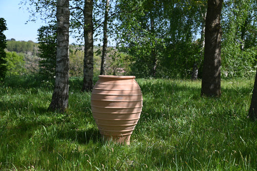 Large pots look great amongst woodland